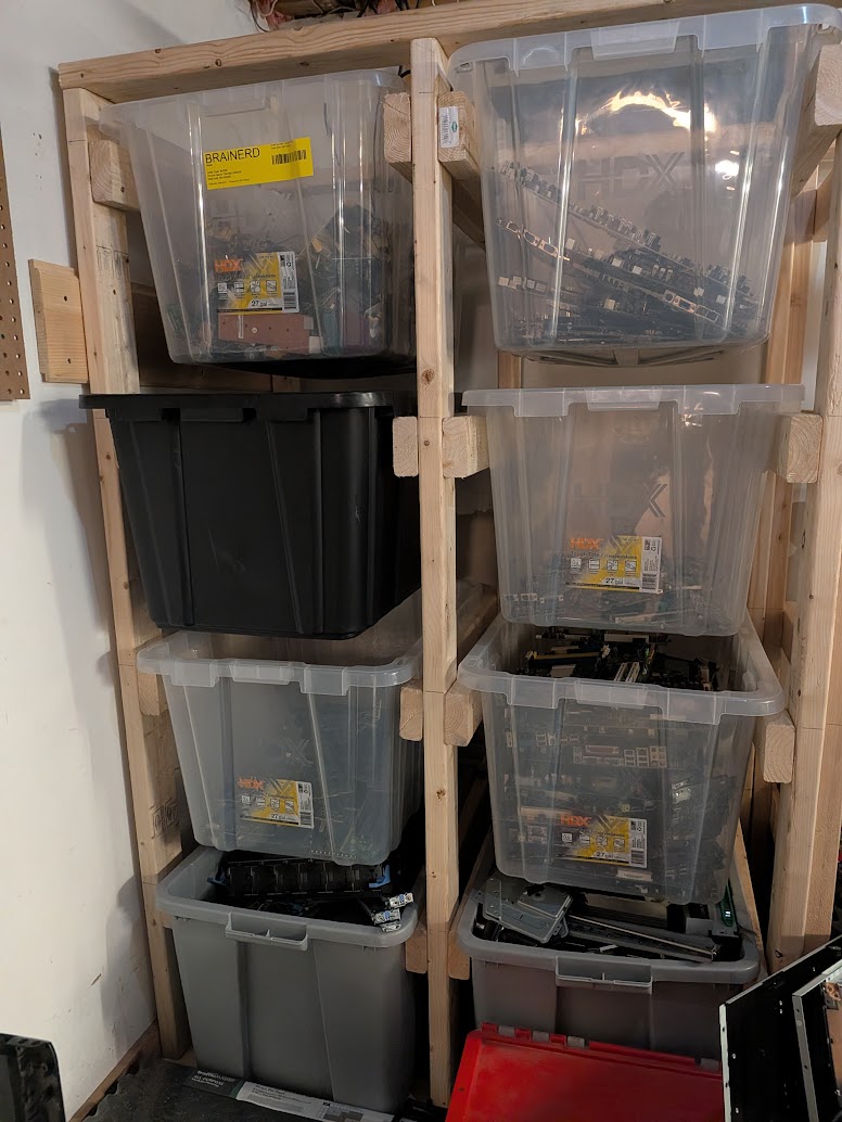 Sorted circuit boards in storage bins